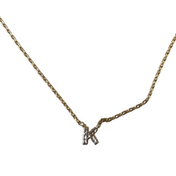 Tiny diamond accents initial K charm connected to a gold finished chain - Picture 2 of 6